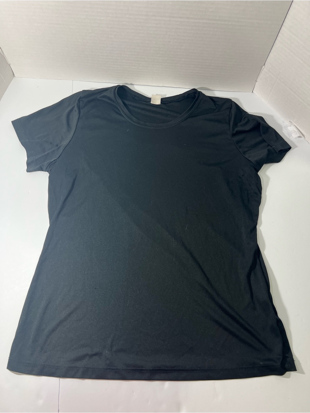 Woman’s Black Sport-Tek Shirt